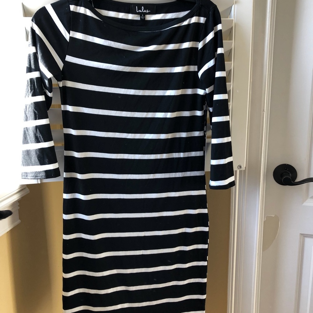 Knee length black and white striped dress